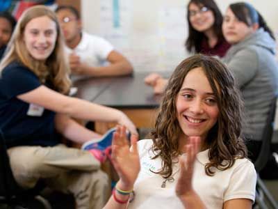 Students applauding and having fun during a lesson